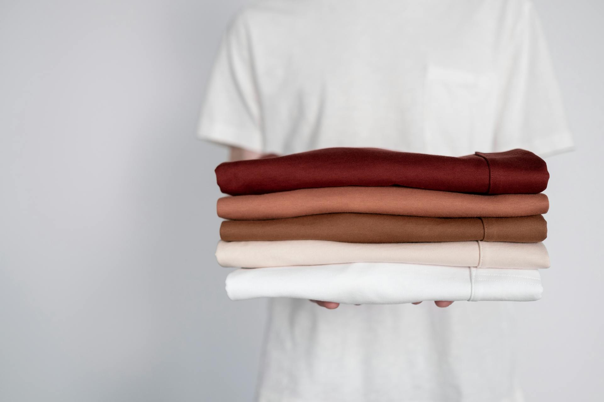 Folded dry-cleaned shirts ready for delivery